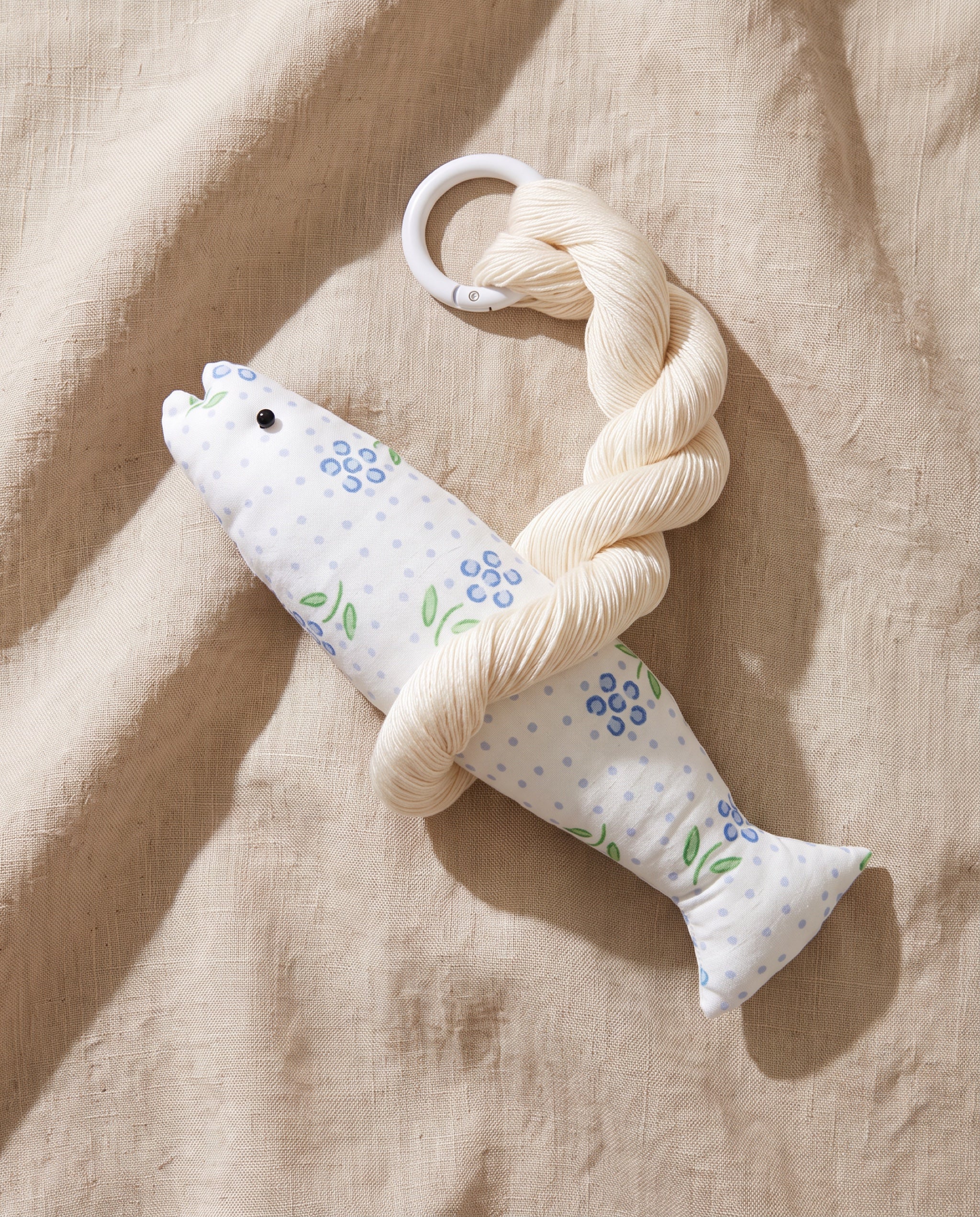 Blair good luck pollack ornament by lemonbaseball livingclub, printed cotton fish and twisted silk hank on beige linen