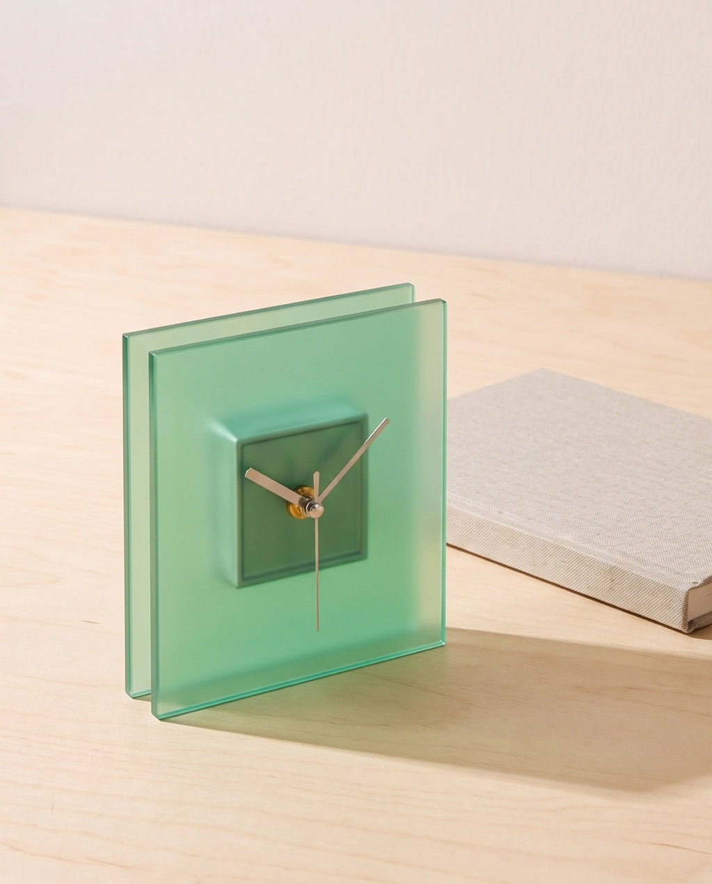 Block clock by APTONE, scale reference beside a closed A5 hardback notebook
