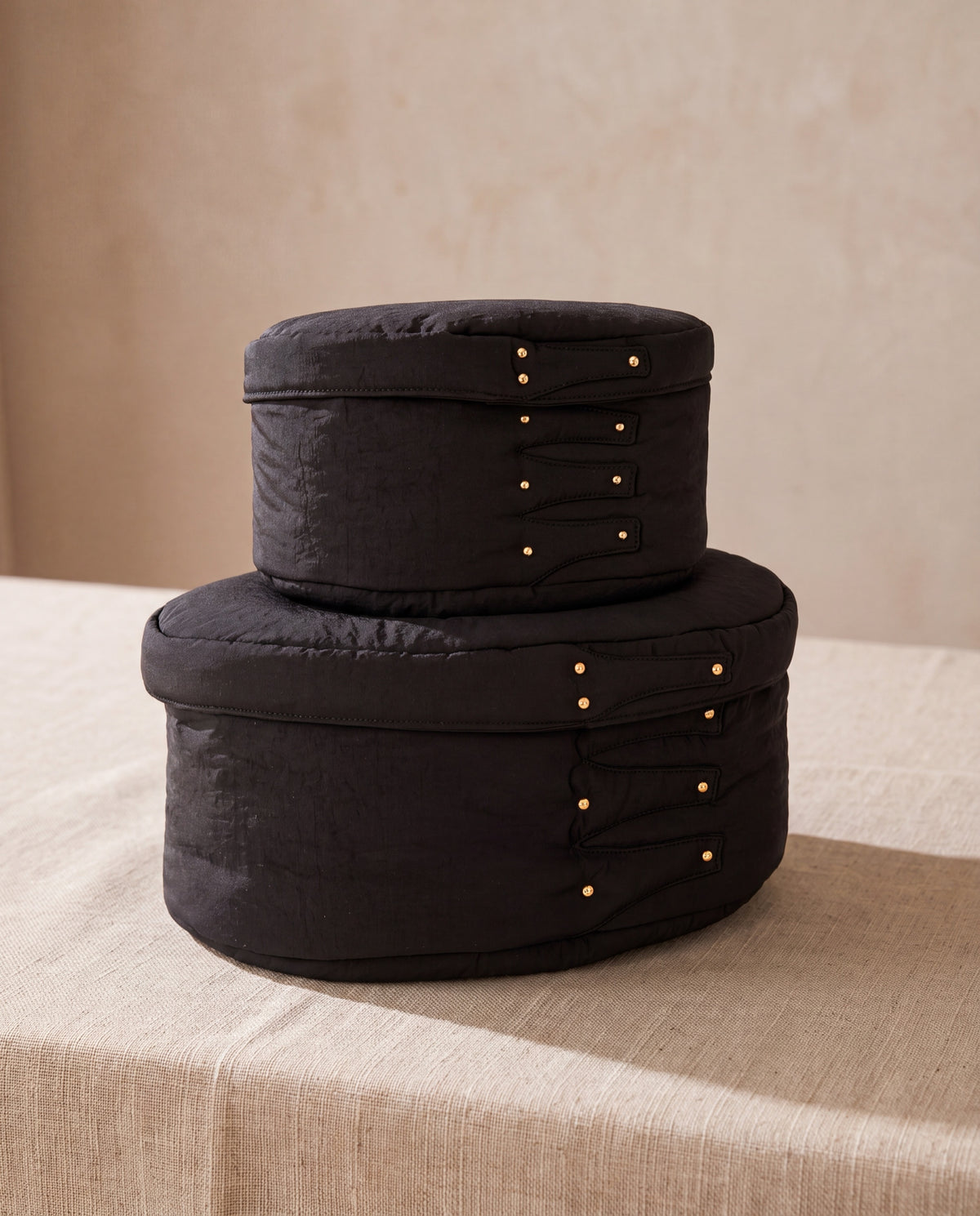 Cloud shaker box, black by life&COLLECT — two sizes stacked on beige linen