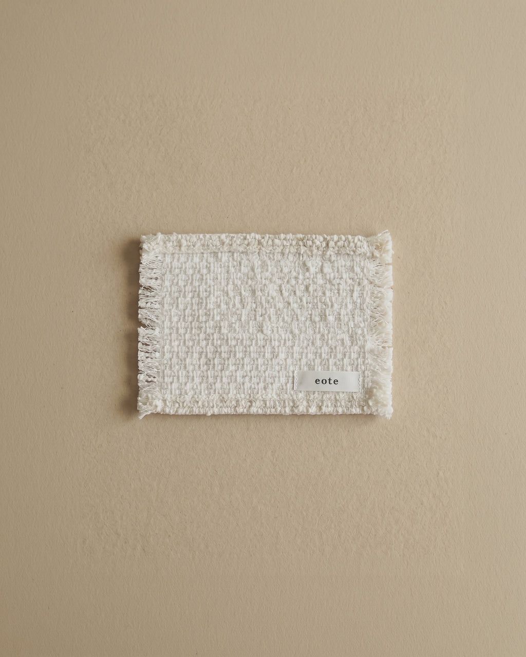 Tasseled tea coaster, set of two
