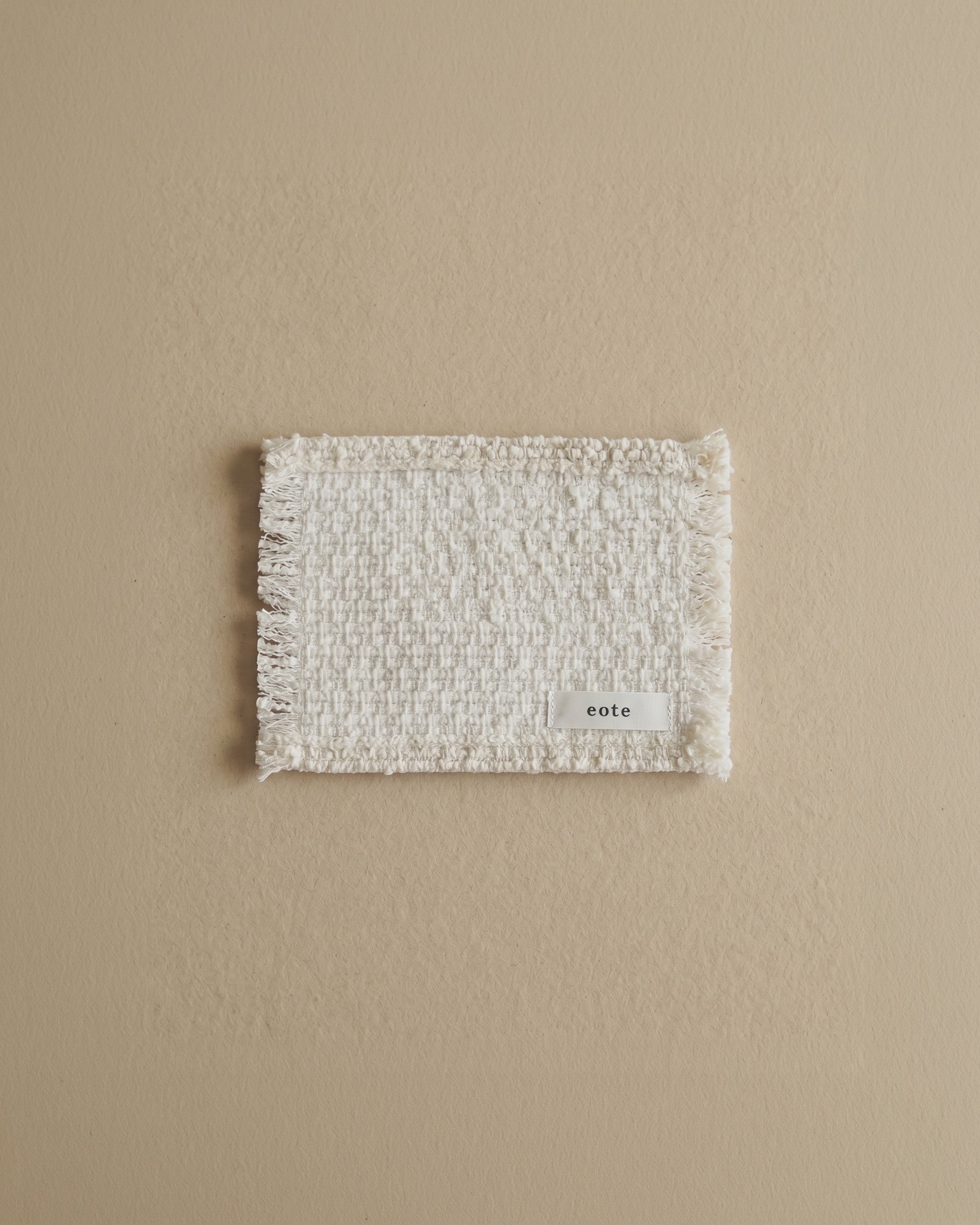 Tasseled tea coaster, set of two