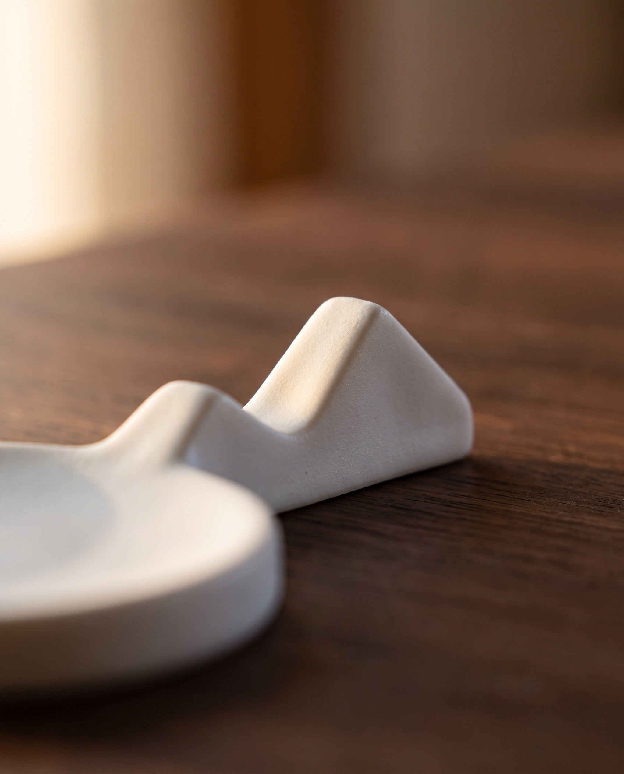 Land scape cutlery rest by Mujagi, close-up of the two peaks and the V notch