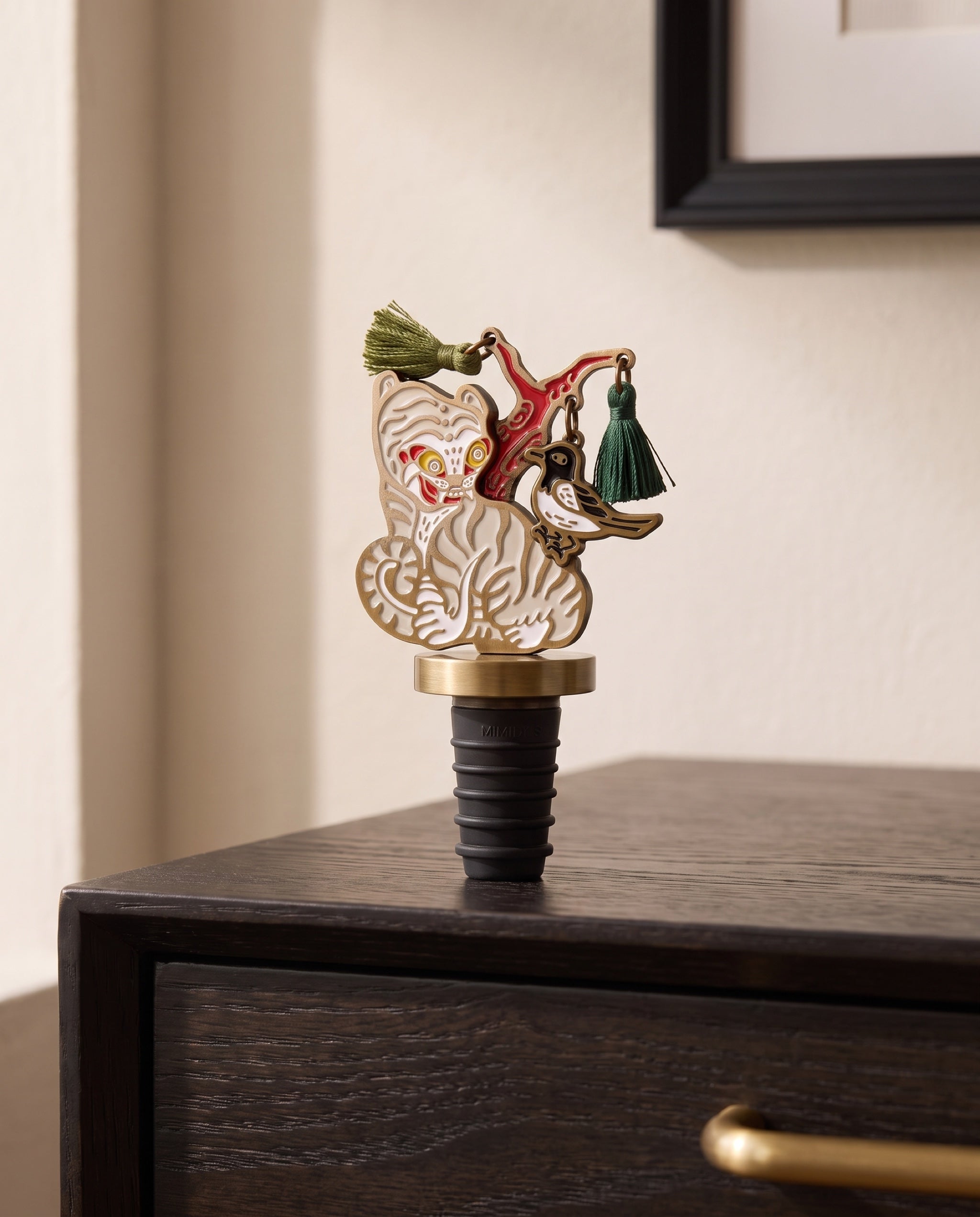 Magpie and tiger wine stopper by Mimidar, the White Tiger on a sideboard