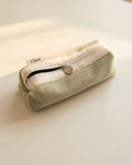 Round pencil case in pale green