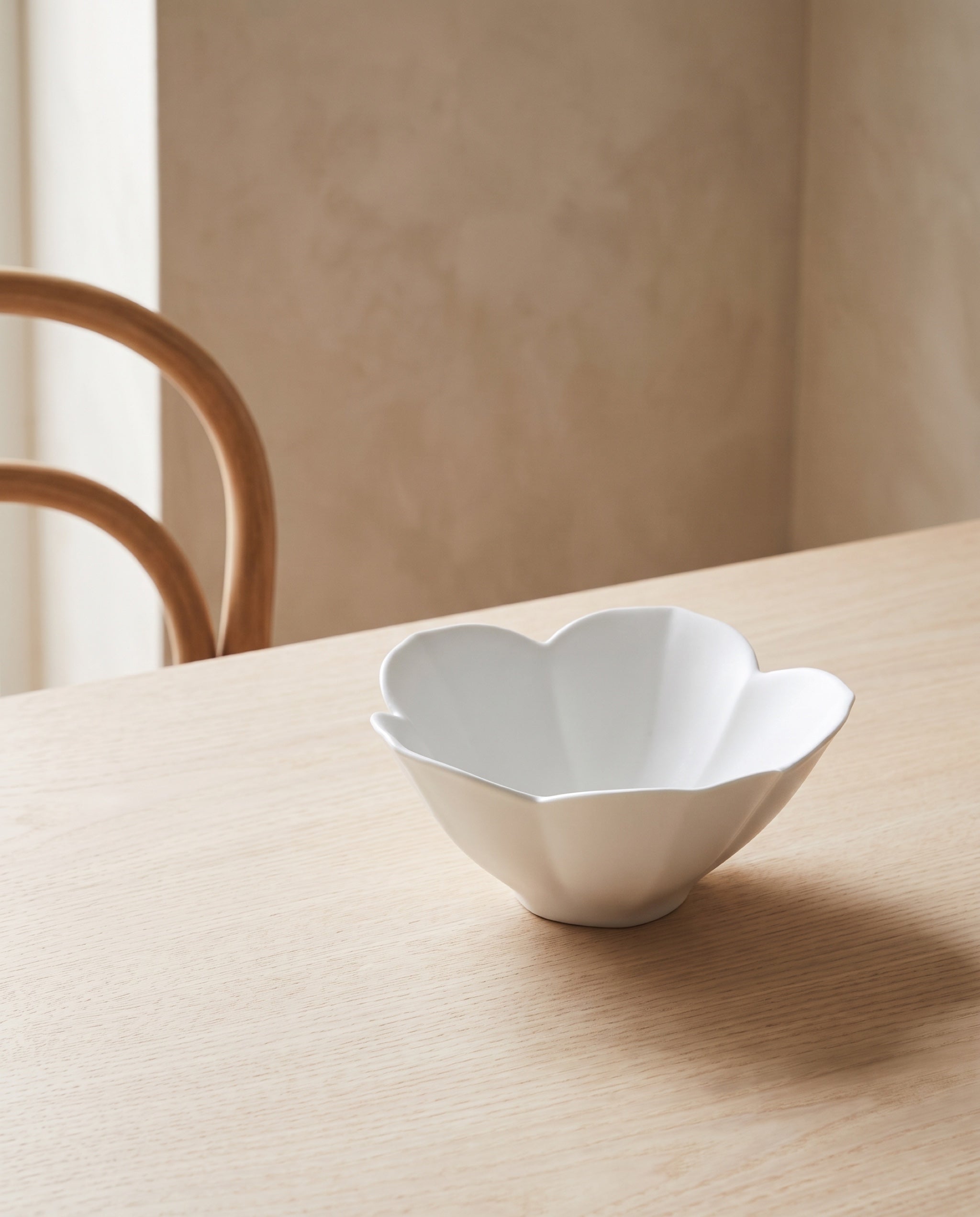 Petal bowl by Mujagi, on a pale ash dining table