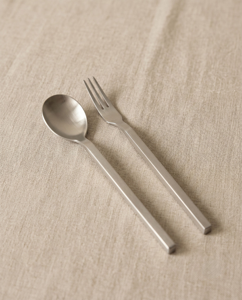 Tea spoon and fork in stainless steel