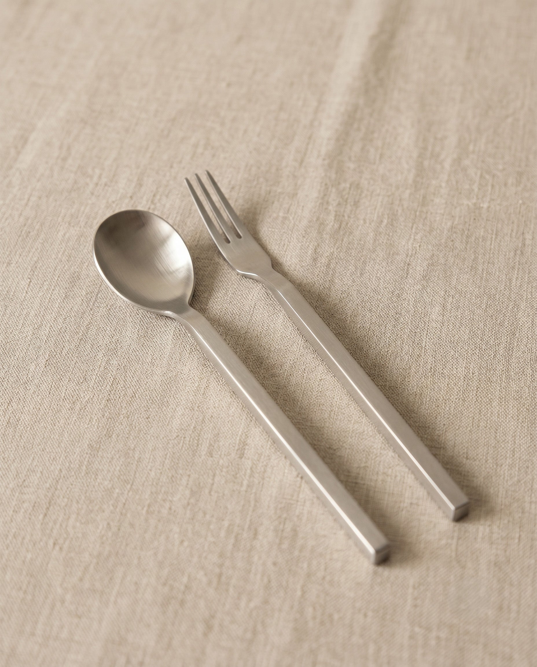 Tea spoon and fork in stainless steel