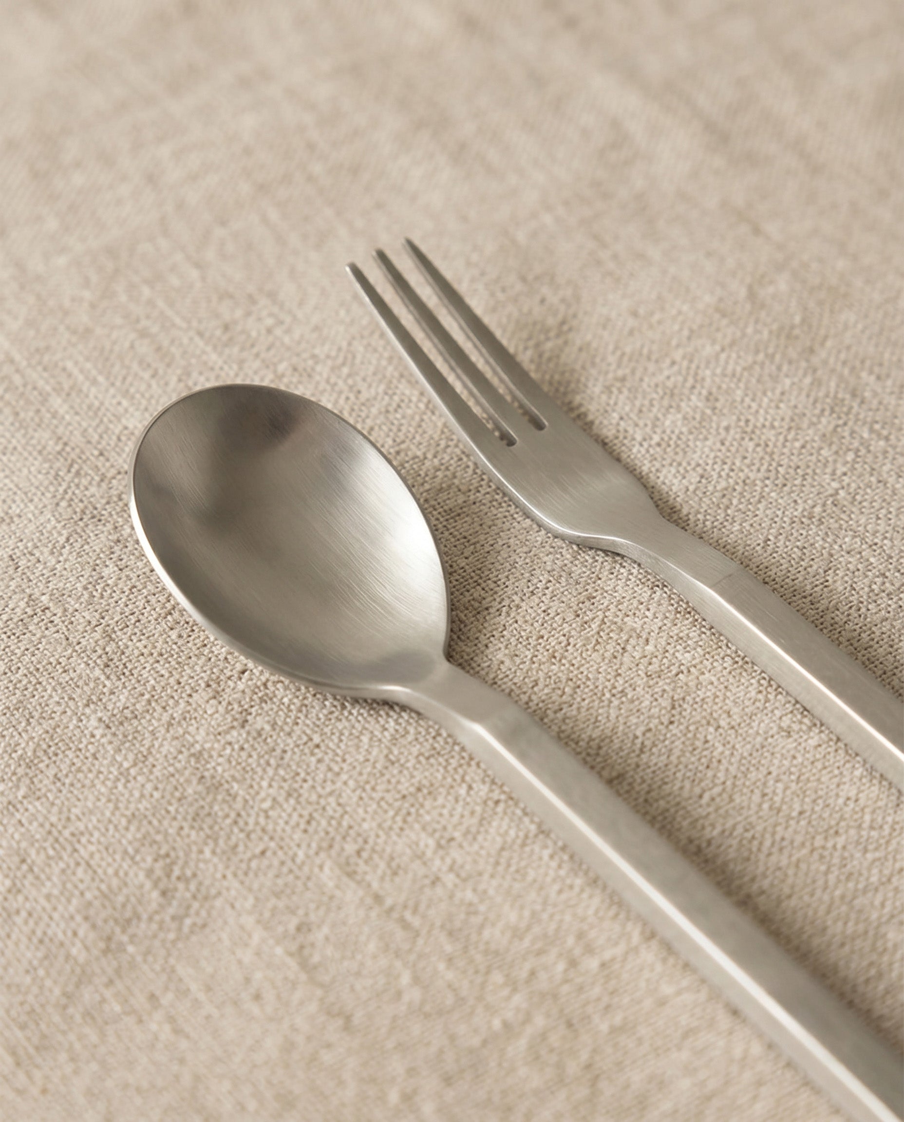 Tea spoon and fork in stainless steel