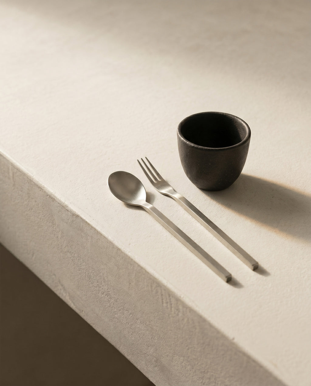 Tea spoon and fork in stainless steel