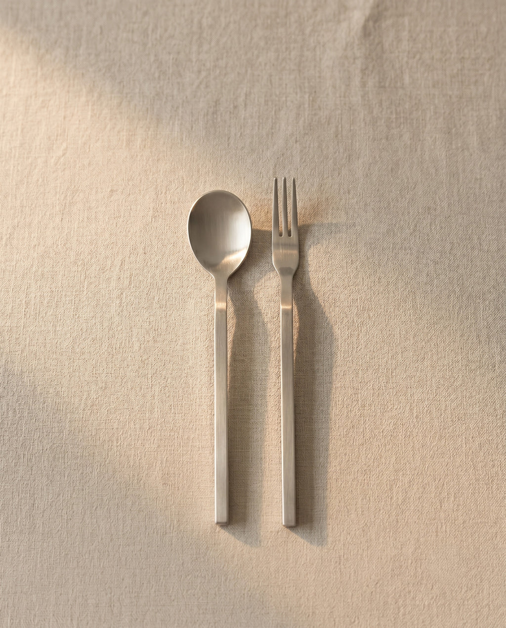 Tea spoon and fork in stainless steel