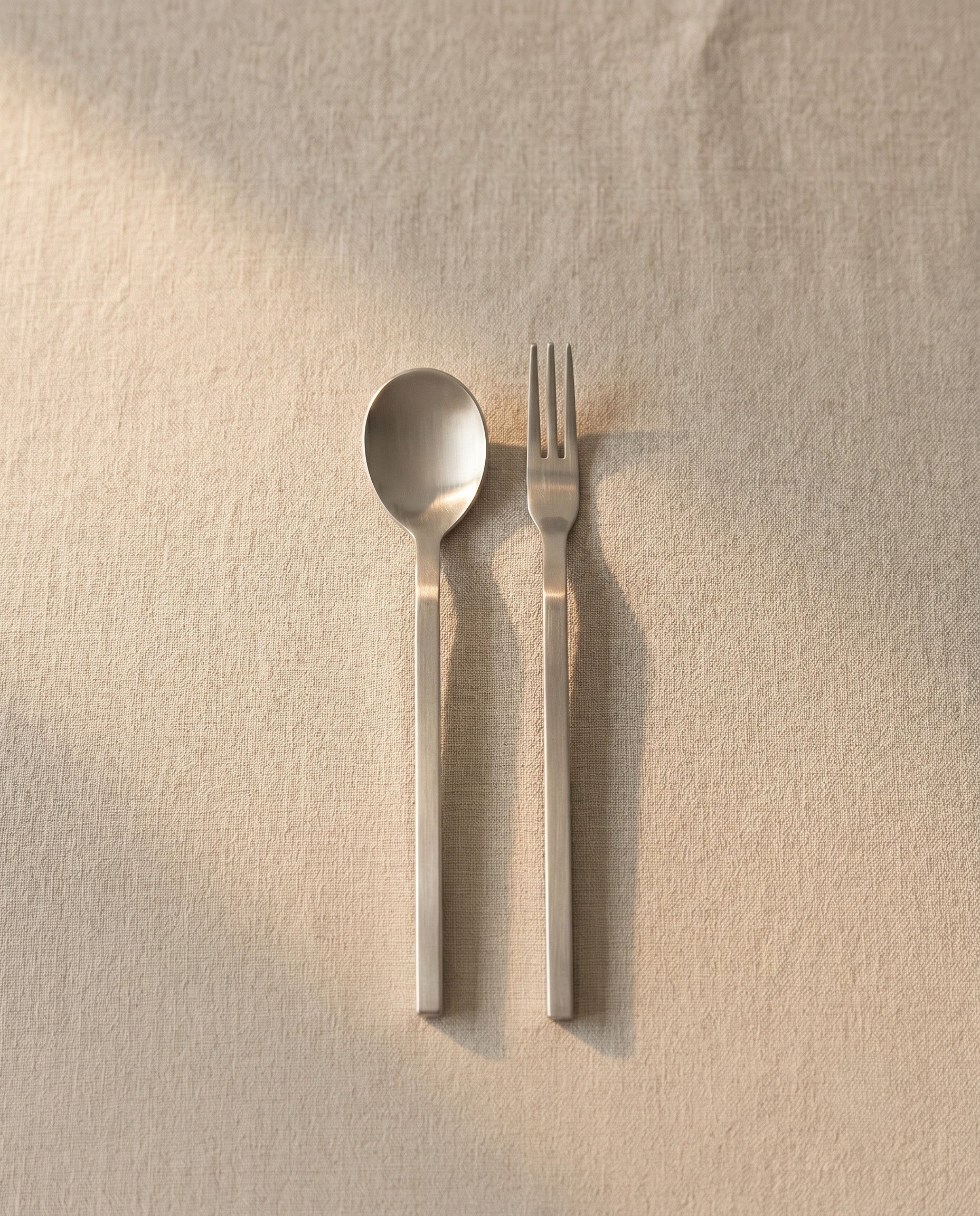 Tea spoon and fork in stainless steel