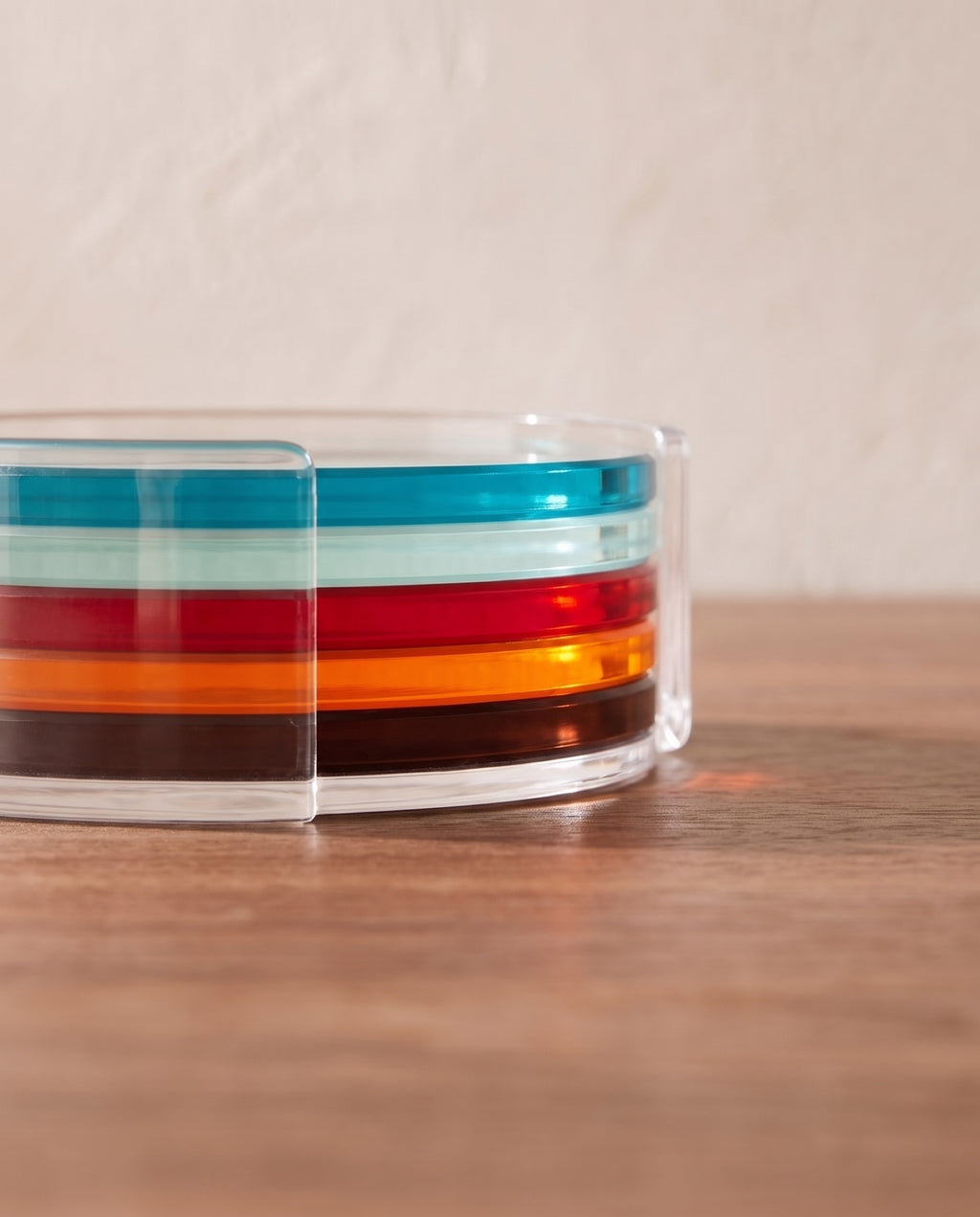 Rainbow coaster by APTONE, material detail of the polished stacked edges and colour through the acrylic