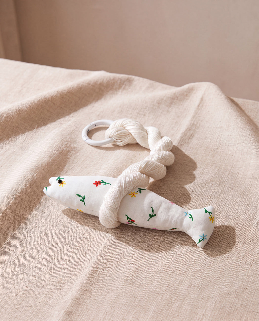 Roa good luck pollack by lemonbaseball livingclub, printed cotton fish with a twisted silk cord, on beige linen