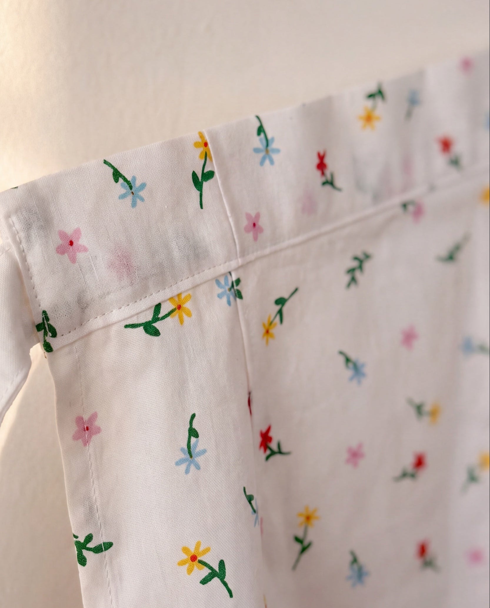 Roa half apron by lemonbaseball livingclub, material detail at the printed waistband and plain white tie