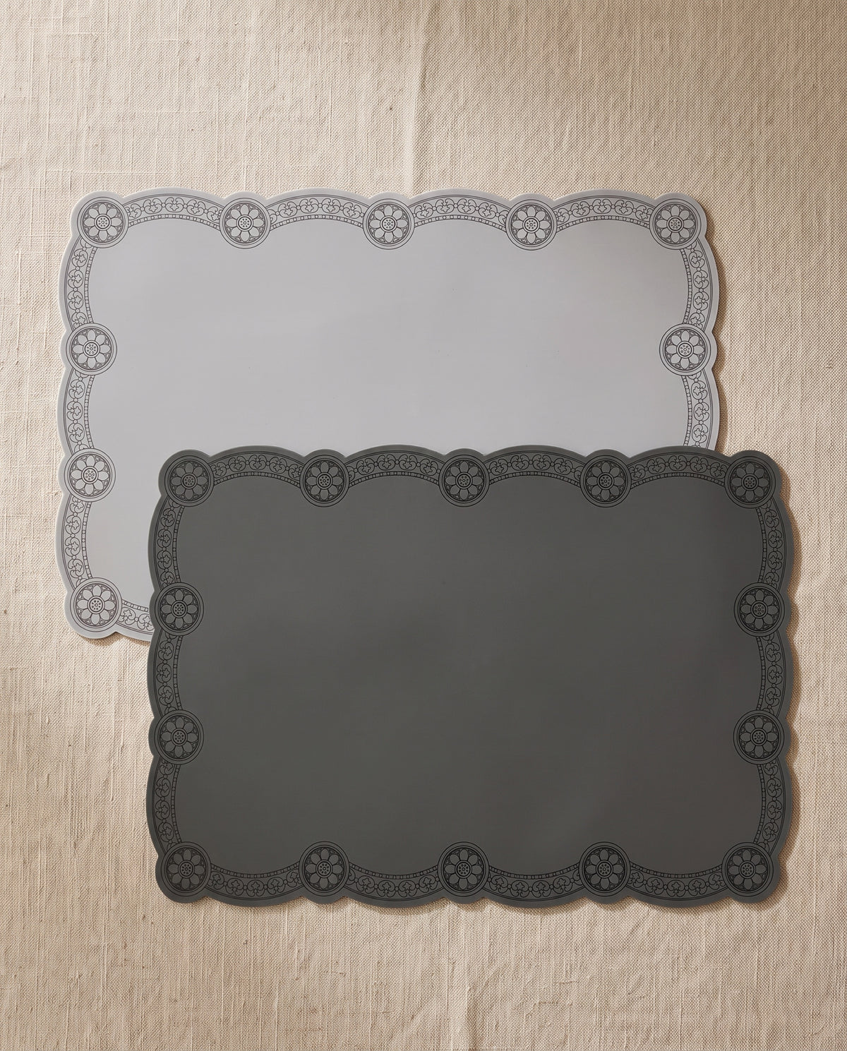 Roof tile silicone table mat by Mimidar, both colorways on beige linen