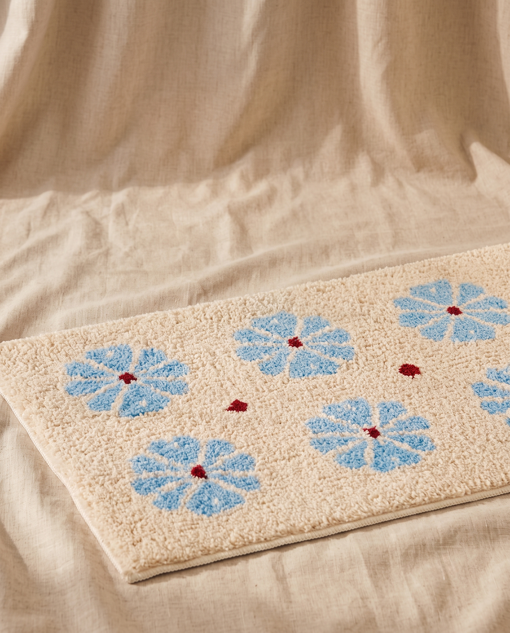 Camellia floor mat in ivory