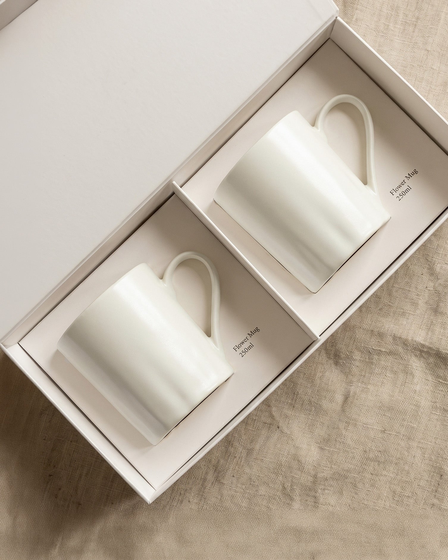 Grid and flower mugs, set of two