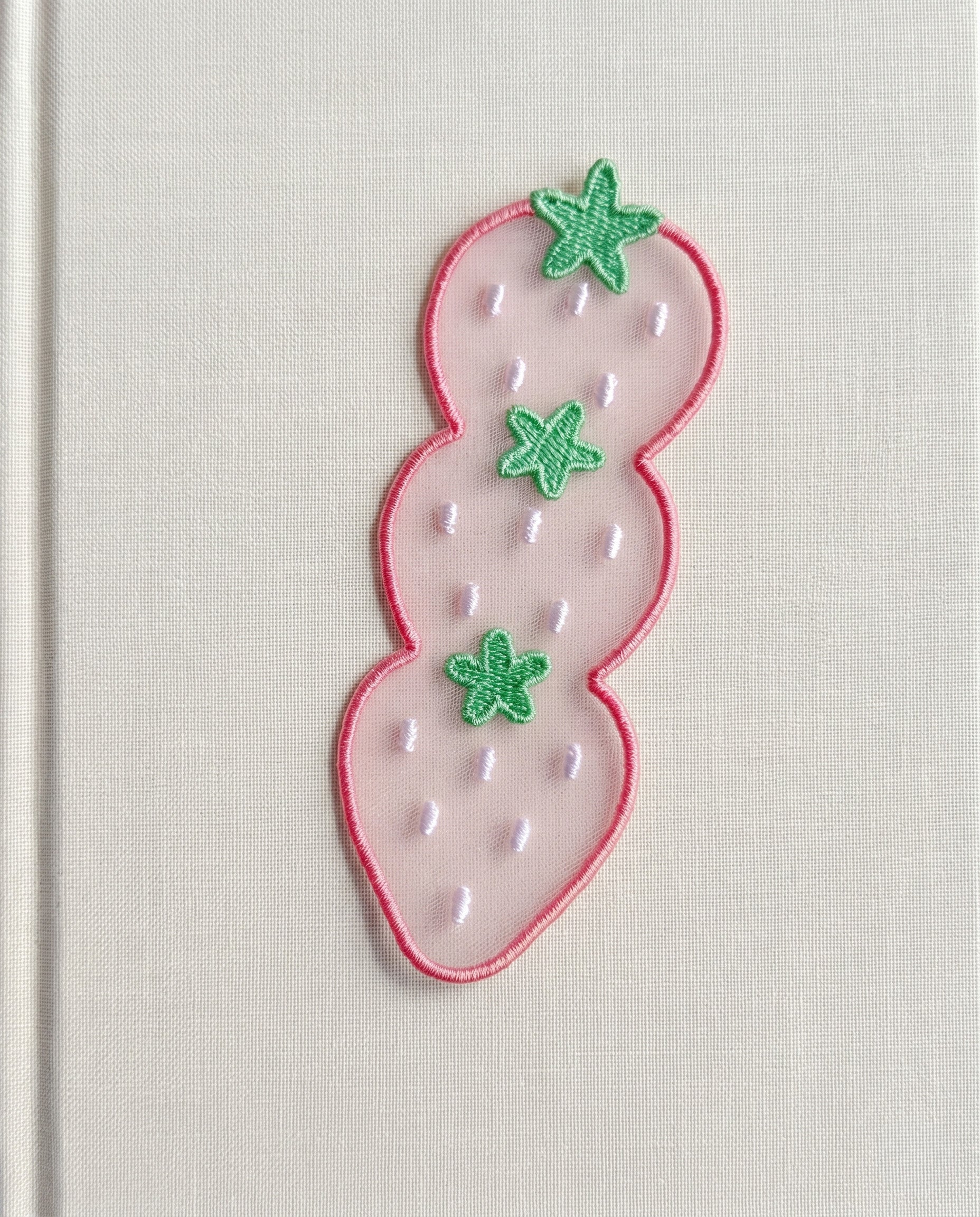 Embroidered bookmarks, set of four