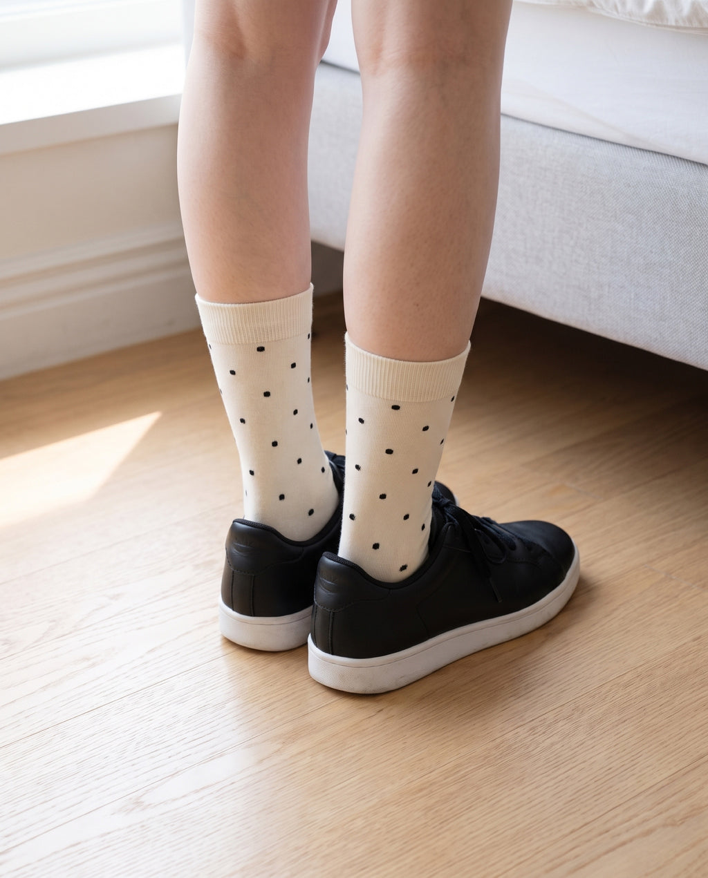 Unisex dot basic socks by 1507, worn at mid-calf with black sneakers